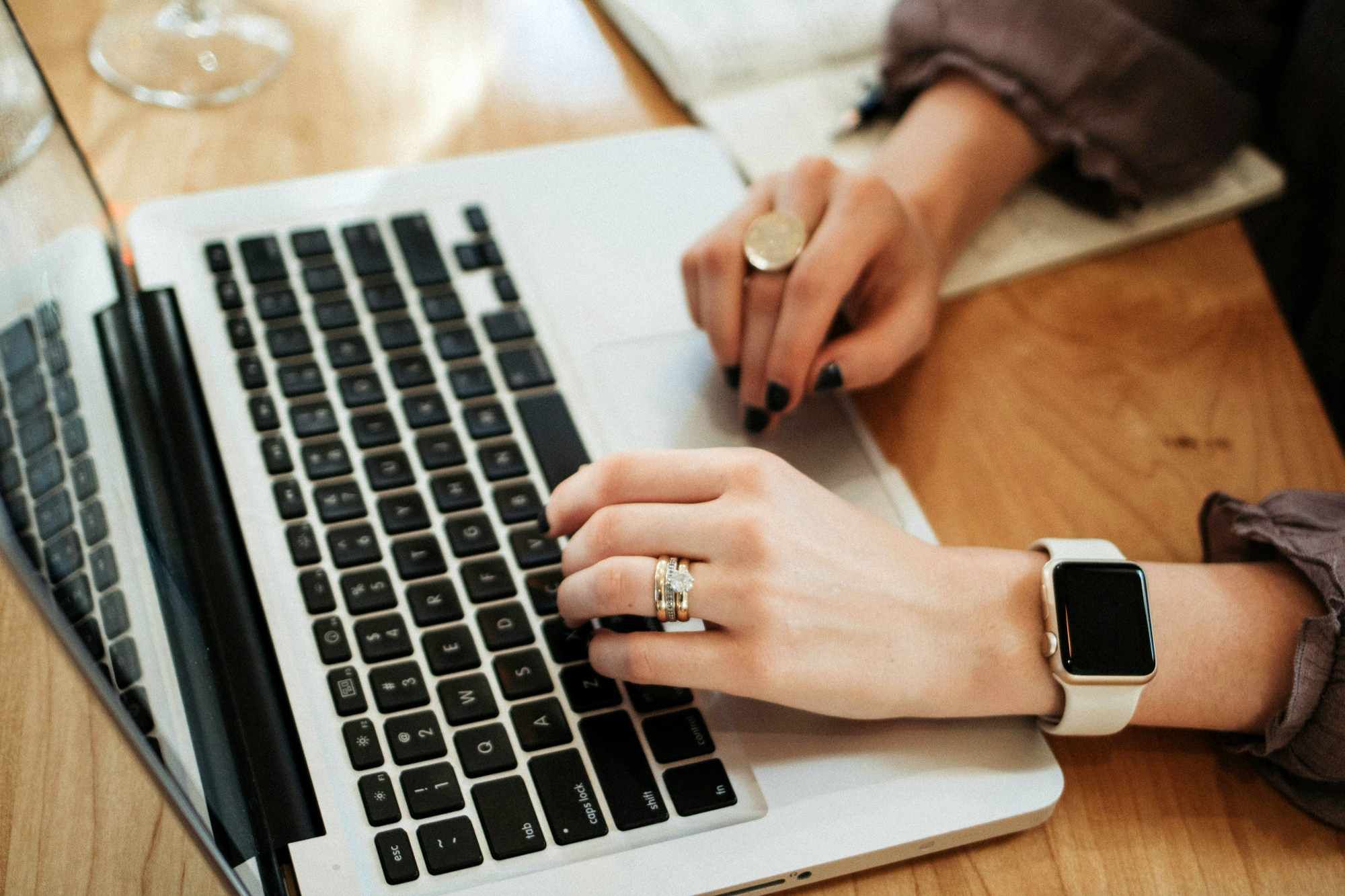Are Startup Companies Good to Work For? Pros and Cons You Should Know. A woman at a computer makes her decision.
